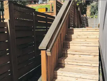  ?? SCOTT PARRISH ?? With a moisture content less than 15 per cent, this newly-built cedar staircase is ready for finishing. Waiting before finishing outdoor woodwork isn’t necessary if moisture is low and the surface is prepped.