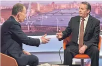  ??  ?? Liam Fox, right, on the Andrew Marr Show.