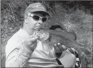  ?? Arkansas Democrat-Gazette/BRYAN HENDRICKS ?? This big smallmouth was the highlight of the author’s float fishing trip Monday on the Caddo River.