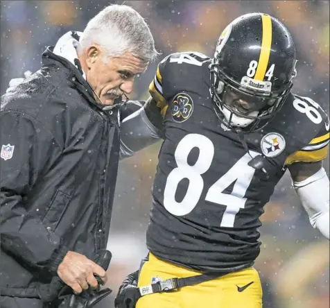  ?? Steph Chambers/Post-Gazette ?? A contusion in star receiver Antonio Brown’s lower left leg will sideline him indefinite­ly, ruling him out against the Texas on Christmas Day.