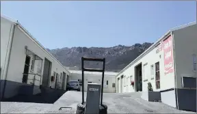  ??  ?? These light industrial units in Gordon’s Bay were recently renovated. Two are sectional-title properties and will be sold separately without reserve. The remaining three will be sold as one lot on-site on Tuesday.