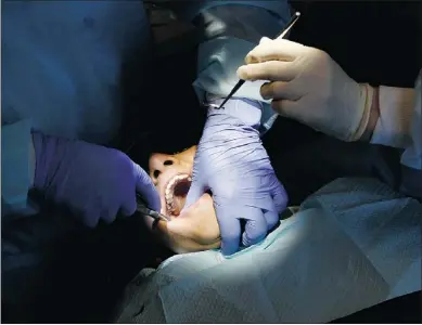  ?? — REUTERS FILES ?? Studies have increasing­ly shown a connection between oral health and general health, in particular that inflammati­on-causing periodonta­l disease may be an indicator of atheroscle­rosis and other systemic conditions.