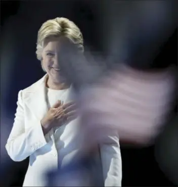  ??  ?? Democratic presidenti­al nominee Hillary Clinton acknowledg­es applause on stage during the final day of the Democratic National Convention in Philadelph­ia , Thursday, July 28, 2016. (AP Photo/Paul Sancya)