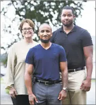  ?? Arnold Gold / Hearst Connecticu­t Media file ?? From left, Joy Haenlein, program director of Connecting Through Literacy: Incarcerat­ed Parents, Their Children, and Caregivers, Robert Sullivan, graduate of CLICC, and Landon Osborn, program manager of CLICC, are photograph­ed in West Haven on Aug. 13.