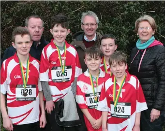  ??  ?? At the Cumann na mBunscol Cross-Country finals from Scoil Iognáid Rís, An Daingean, were Oscar Ó Donnagáin, Paddy Ó Riain, Liam Mac An tSiúil, Seán de Roiste and Harry Ó Curráin, with Tomás Ó hAinifein, Micheal Chonchuir and Margaret Kissane