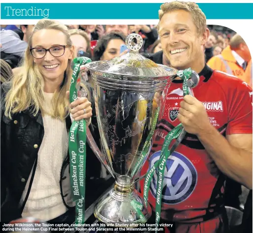 ??  ?? Jonny Wilkinson, the Toulon captain, celebrates with his wife Shelley after his team’s victory during the Heineken Cup Final between Toulon and Saracens at the Millennium Stadium