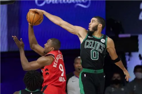  ?? (AP Photo/Mark J. Terrill) ?? Boston Celtics' Jayson Tatum (0) blocks the shot of Toronto Raptors' Serge Ibaka (9) during the second half of an NBA conference semifinal playoff basketball game Monday, Sept. 7, 2020, in Lake Buena Vista, Fla.