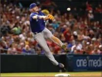  ?? CHRISTIAN PETERSEN, GETTY IMAGES ?? Josh Donaldson not only homered, but had a good game at third base, fielding this ground ball in the seventh of Wednesday’s contest.