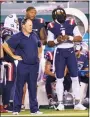  ?? Chris Szagola / Associated Press ?? New England Patriots coach Bill Belichick, left, looks on with quarterbac­k Cam Newton, right, during a preseason game against the Philadelph­ia Eagles in August.