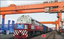  ?? DING TING / XINHUA ?? A China-Europe freight train, which departs from Duisburg, Germany and carries exhibits for the China Internatio­nal Import Expo, arrives in Shanghai on Oct 11.