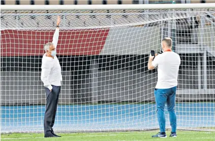  ??  ?? Size matters: Tottenham head coach Jose Mourinho discovers the goal is too small before his side’s Europa League game in Macedonia