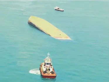  ??  ?? Ill-fated vessel: A screenshot from China Central Television’s video showing the capsized ‘JBB Rong Chang 8’ vessel off Tanjung Tohor in Johor.