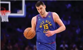  ?? Photograph: Kyle Ross/ USA Today Sports ?? Nikola Jokic and the Denver Nuggets are the forerunner­s of the NBA’s offensive explosion, leading the league with an offensive rating of 117.4 through Thursday.