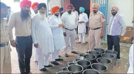 ?? HT PHOTO ?? Jasmail Singh Laddi Gehri (fourth from left), husband of Congress MLA from Ferozepur (rural) Satkar Kaur, during his unauthoris­ed visit to the central jail on Friday.