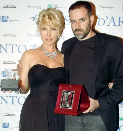  ?? (Olycom) ?? Premiati Il regista Fausto Brizzi, 48 anni, con Nancy Brilli, di 53
