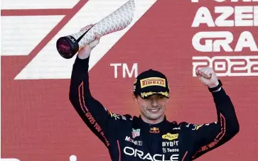  ?? EFE ?? El festejo del piloto neerlandés Max Verstappen, quien es el líder del Mundial.