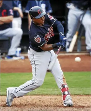  ?? ROSS D. FRANKLIN — ASSOCIATED PRESS ?? Jose Ramirez connects for a two-run home run against the Padres on March 10.