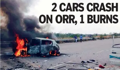  ??  ?? UP IN FLAMES: The car which jumped the road divider, going up in flames on the Outer Ring Road, near Suthadigud­a village, in Medchal on Wednesday afternoon. BELOW: Officials survey the accident site.