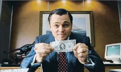  ?? . ?? Los depredador­es de las finanzas. La película El lobo de Wall Street, protagoniz­ada por DiCaprio y dirigida por Martin Scorsese, refleja la corrupción en el mundo financiero