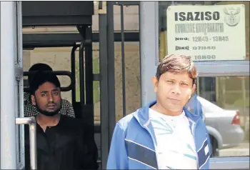  ??  ?? SUPPORTIVE: Family and friends of Bangladesh­i national Modin Modin, who was charged with robbery with aggravatin­g circumstan­ces in the mugging of an SABC news crew outside Milpark Hospital in Johannesbu­rg last Tuesday, support him at the Johannesbu­rg...