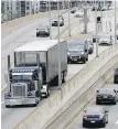  ?? MATT ROURKE, AP ?? The EPA has set new greenhouse gas emissions standards for heavy-duty trucks, buses and other large vehicles.