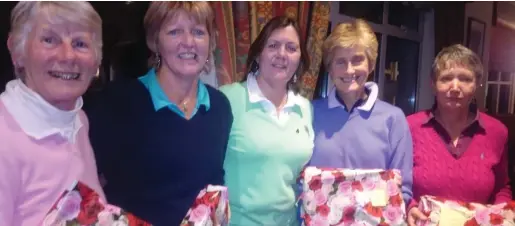  ??  ?? Noeleen Moffatt Lady Captain Carrick on Shannon Golf Club presenting prizes on Captain’s Day Out to Roscommon Golf Club to: Mary O’Rourke, Anna Smith, Lorna Baker and Attracta O’Connor.