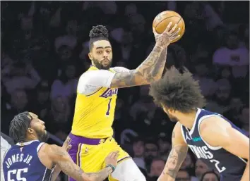  ?? Allen J. Schaben Los Angeles Times ?? LAKERS guard D’Angelo Russell is averaging 27.3 points and 5.6 assists while starting the last three games.