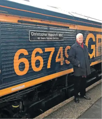  ?? GBRF. ?? GB Railfreigh­t helped Chris Hopcroft to mark the end of his 60-year career in December 2019 by naming a Class 66 locomotive in his honour.