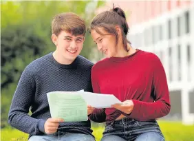  ?? Richard Swingler ?? > Charlie Small, left, and Frankie Jones with their results