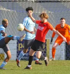  ?? ?? Woodley’s defence held out against an Enfield onslaught