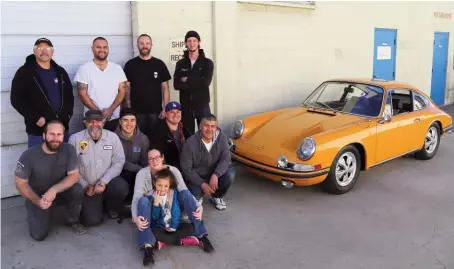  ??  ?? Meet the team! John Esposito (back row, left) has a long background in classic car restoratio­n, before opening his own dedicated Porsche shop in 2009
PRACTICAL PORSCHE