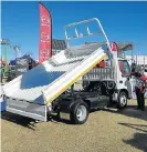  ??  ?? Top: Hino has introduced an automatic transmissi­on to its 300 Series. Above: Hino SA says the dropside tipper is proving popular in its smaller model.