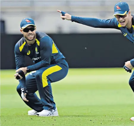 ??  ?? Together again: David Warner, Steve Smith and Cameron Bancroft, the Cape Town Three, train yesterday to face England