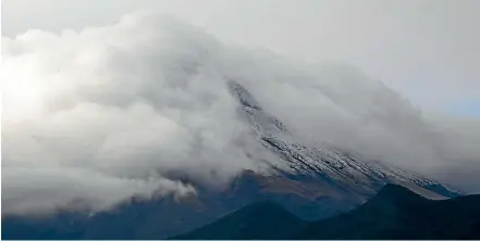  ?? GLENN JEFFREY/STUFF ?? Mt Taranaki received a summer dump of snow overnight on Saturday.