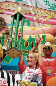  ??  ?? Miki Sudo, 41, of Las Vegas ate 41 hot dogs at Nathan’s Famous eating competitio­n, winning the contest’s women’s division for the fourth consecutiv­e year.