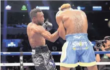  ?? STEVE LUCIANO/ASSOCIATED PRESS ?? Austin Trout, left, throws a punch at Jarrett Hurd during their fight in 2017. Trout will fight Jermell Charlo on Saturday in Los Angeles, where one expert says Trout will get ‘the beating of a lifetime.’