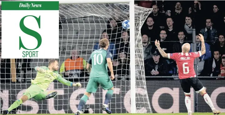  ?? | EPA ?? HARRY Kane, centre, scores Tottenham Hotspur’s second goal during last night’s Champions League match against PSV Eindhoven in Eindhoven.