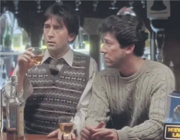  ?? ?? ↑ Denis Lawson as Gordon Urquhart, left, and Peter Riegert as Mac in the fictional Macaskill Arms, with the scene filmed in the Ship Inn in Banff