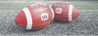  ?? JOHN WOODS/THE CANADIAN PRESS ?? The new CFL balls are made with harder leather and a slightly larger circumfere­nce. The same leather is used for NFL balls.