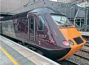  ?? BC Collection ?? Around two weeks before XC HST workings were suddenly stopped, power car
No. 43357 pauses at Birmingham New Street on November 15, at the tail end of 1S51 Plymouth-Edinburgh (No. 43301 was leading).