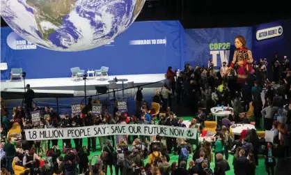  ?? Photograph: Robert Perry/EPA ?? The Cop26 climate summit in Glasgow. ‘Leaving the 2030 targets to languish until the next Paris updates is far too late for the climate.’