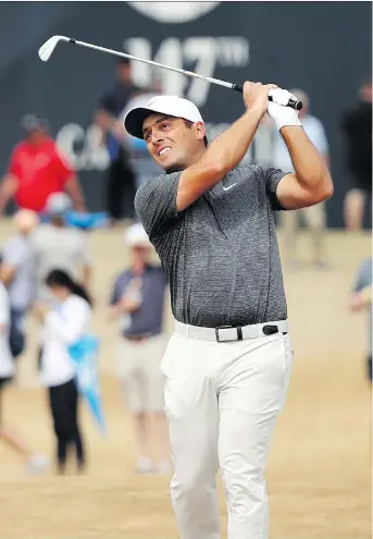  ?? PETER MORRISON/THE ASSOCIATED PRESS ?? Francesco Molinari withstood any number of challenger­s during a wild and crazy final round at the British Open before winning by two strokes at Carnoustie, Scotland, on Sunday.