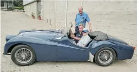  ?? ?? TRIUMPHANT TEAM: Ian Storer, organiser of the fun drive quiz, with driver Daphne McNeill from Kenton-on-Sea and navigator Shirley Martin in a Triumph TR 3 1957. The Triumph was delayed after a slight mishap. However, the next morning it was up and running and back in Kenton. ‘Driving like a bird again,’ commented chair Dean Wallace.