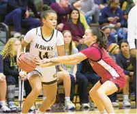  ?? ?? Bethlehem Catholic’s Aliyah Brame, left, is defended by Easton’s Megan Elias.