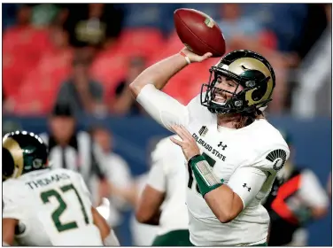  ?? AP/DAVID ZALUBOWSKI ?? Junior quarterbac­k Collin Hill has completed 56 of 79 passes for 741 yards and 7 touchdowns with 2 intercepti­ons for Colorado State this season entering Saturday’s game against Arkansas. “I think he’s grown into that position of being a leader,” Rams Coach Mike Bobo said.