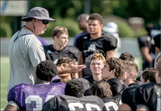  ?? Arkansas Democrat-Gazette/ANTHONY REYES ?? Fayettevil­le Coach Daryl Patton guided the Bulldogs to state championsh­ips in 2007, 2011 and 2012 and his team is expected to be in the mix for another state title this season with 14 starters returning from a team that won 11 games last season.