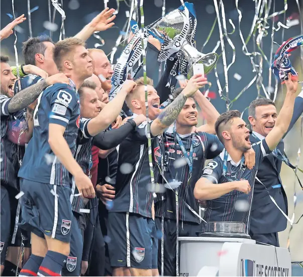  ??  ?? JEWEL IN THE CROWN: The Staggies players celebrate at Hampden back in March 2016 following their League Cup final win over Hibernian, the club’s first major