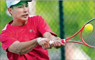  ?? TIM MARTIN/THE DAY ?? St. Bernard’s Alex Zuczek became just the second boy to win four straight ECC singles titles, joining former East Lyme great Tom Santoro. Zuczek, who will attend Carleton College next year in Northfield, Minn., then capped his career with a Class S...