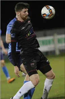  ??  ?? Wexford winger Seán Hurley brings the ball under control.