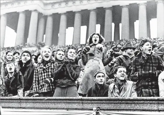  ?? CHICAGO TRIBUNE ?? Mount Carmel fans cheer as the Catholic League champion Caravan rallied to tie Public League champ Fenger 13-13 in the Prep Bowl on Dec. 2, 1939, at Soldier Field.